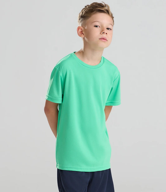 Child wearing a green sports jersey on a plain background