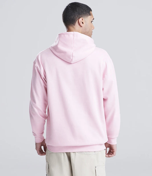 Person wearing a pink hoodie from behind on a light gray background
