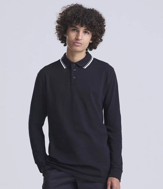 Person wearing a black long-sleeve polo shirt with white trim on a light gray background